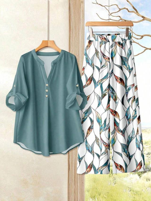 green long sleeve shirt and abstract print loose pants