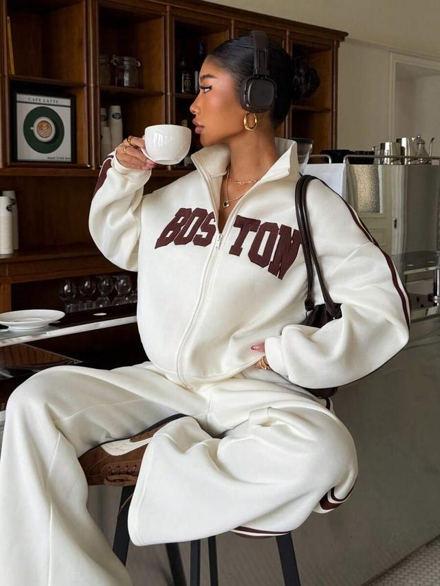 off-white zip-up sweatshirt with matching wide-leg sweatpants