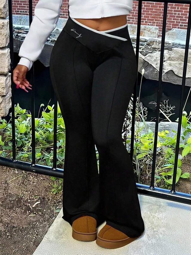 black contrast edge flared athletic leggings