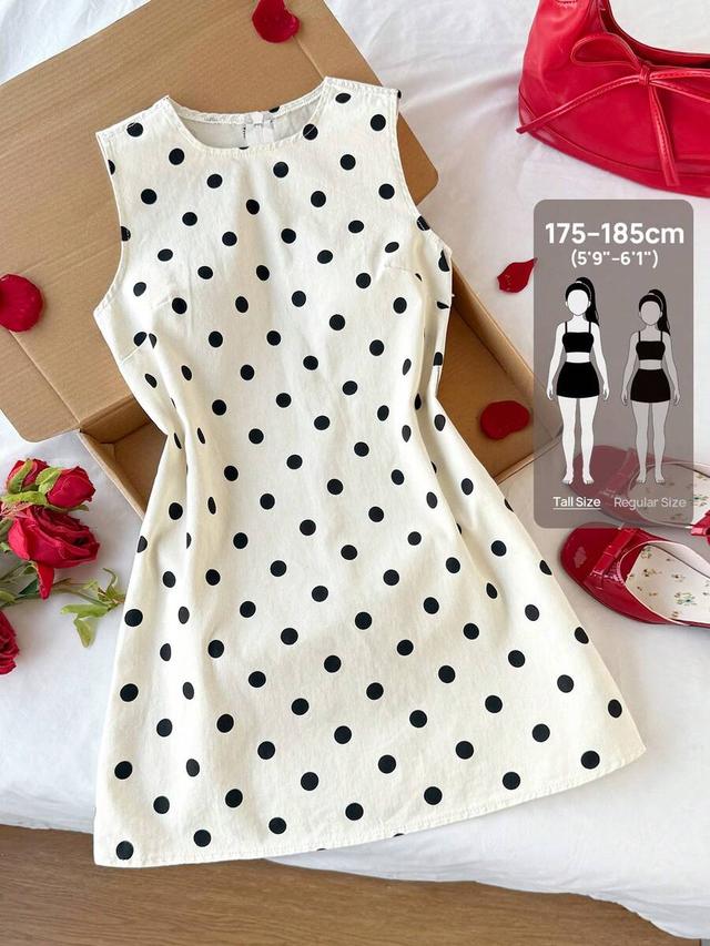 white and black polka dot sleeveless shift dress