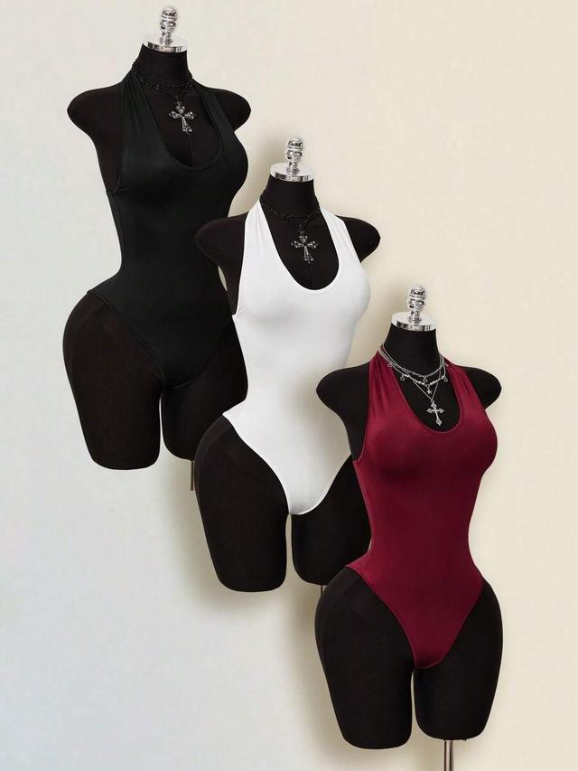 white backless halter bodysuit