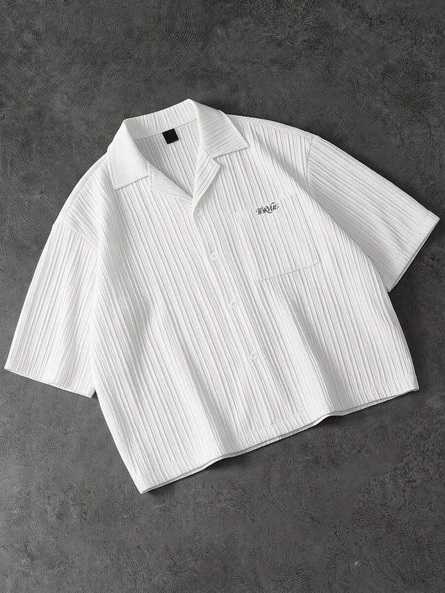 white textured short sleeve casual button down shirt