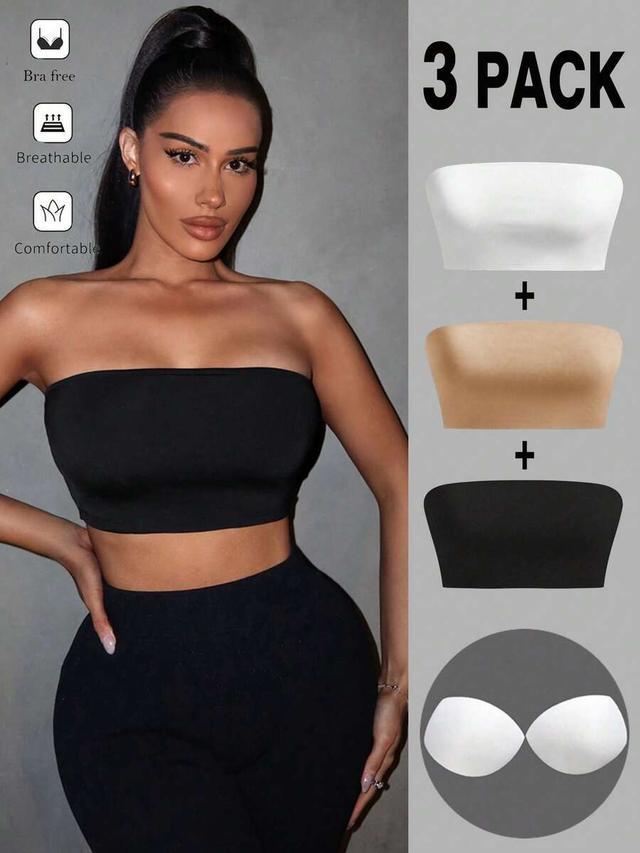 white stretch strapless cropped tube top with built-in pads