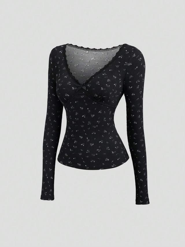 black ditsy floral ribbed long sleeve bow top