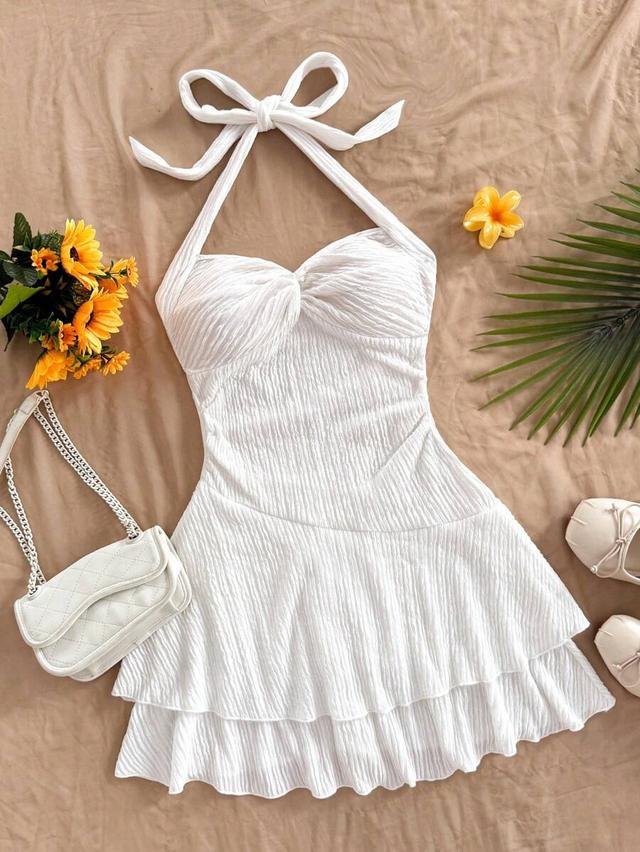 white textured backless mini dress with neck tie