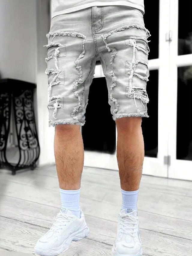 men's light wash distressed fringe denim shorts