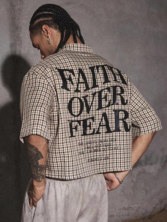 men's beige and black plaid short sleeve shirt