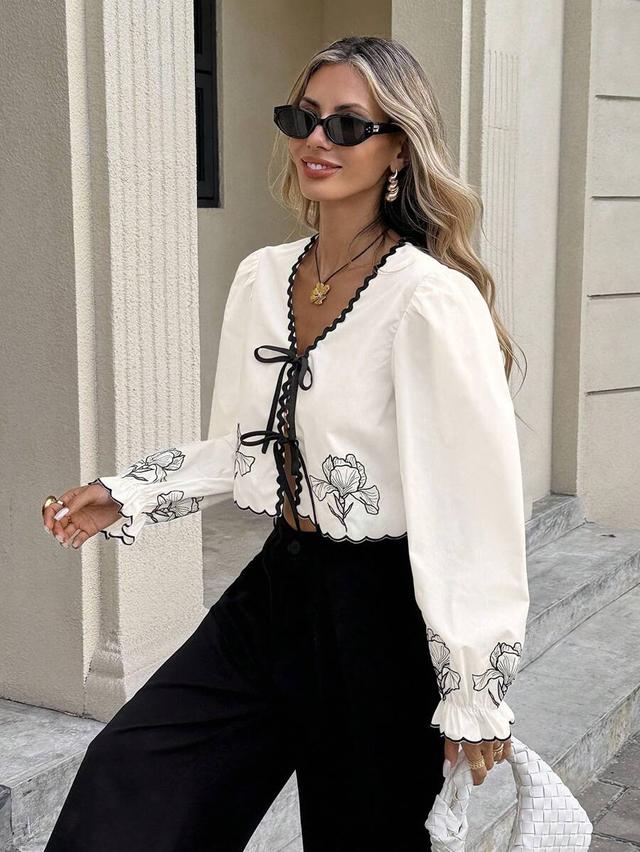 off-white floral embroidered lace-up woven blouse