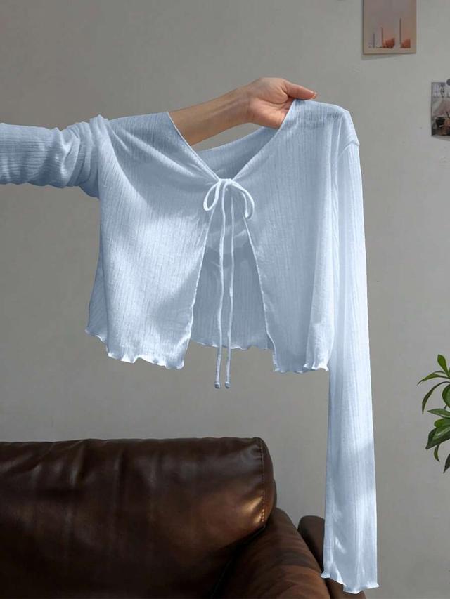 light blue long sleeve knit shrug with tie front