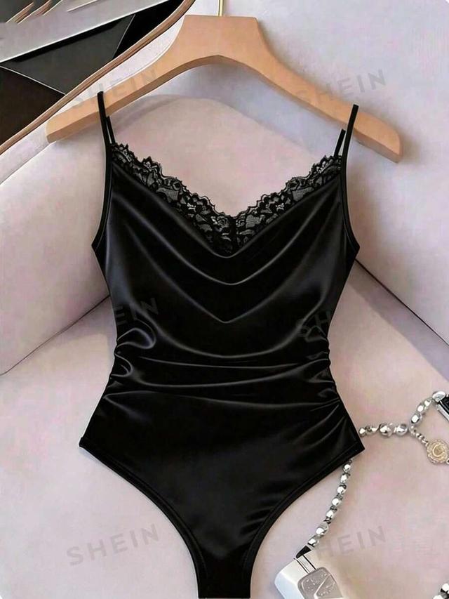black satin camisole bodysuit with lace chest detail
