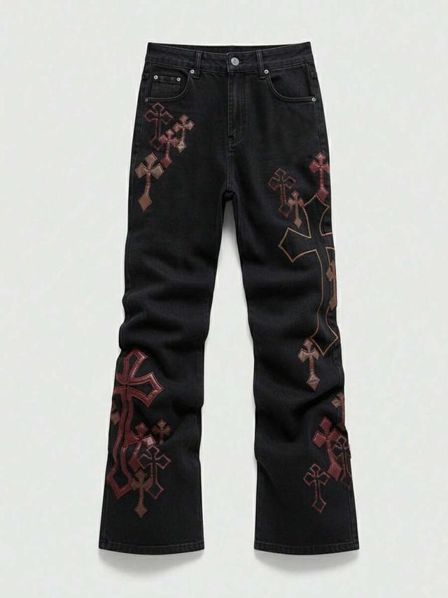 black denim jeans with cross embroidery and slant pockets
