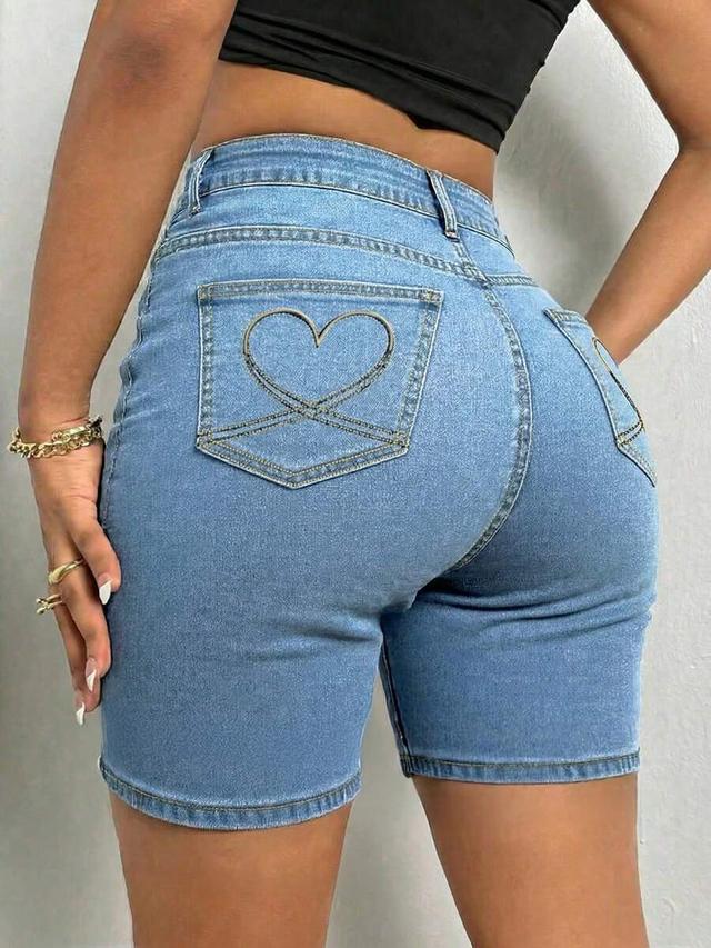 light wash denim shorts with heart back pocket stitching