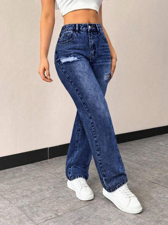 distressed medium wash high rise straight leg jeans