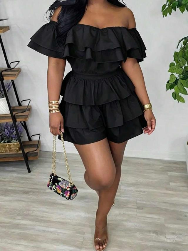 black off-shoulder tiered ruffle playsuit