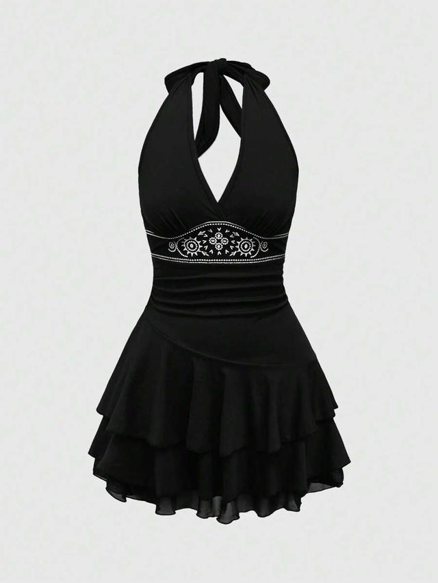 black halter neck layered mini dress with sun embroidery