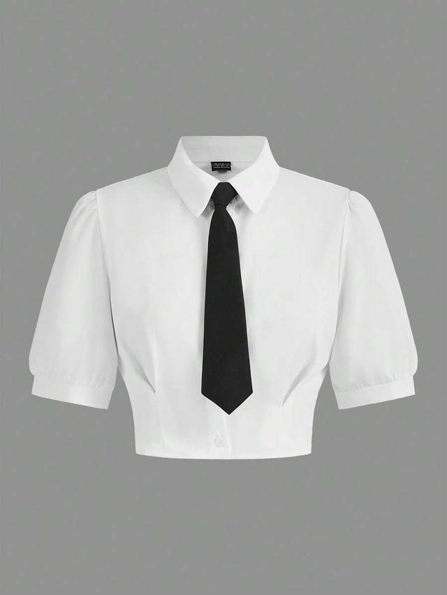 white solid crop shirt with black tie