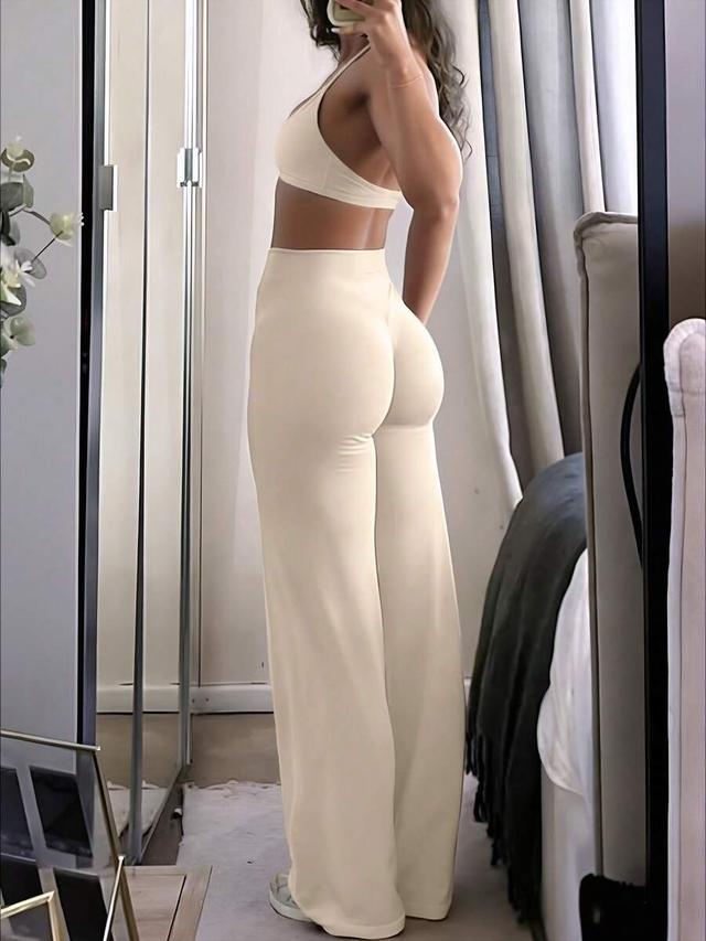 women's solid beige slim fit flare trousers
