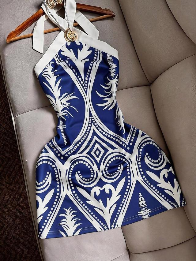 blue and white printed halter neck mini dress