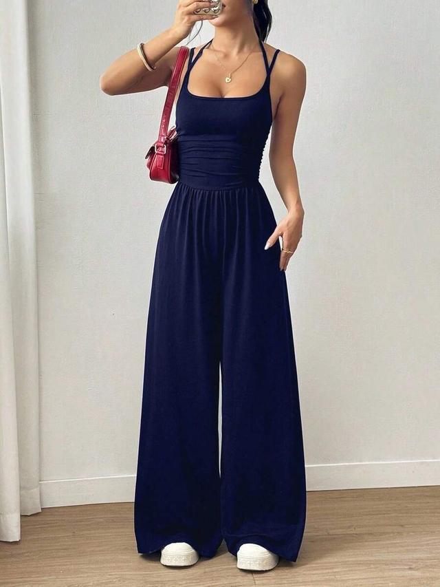 navy sleeveless halter neck jumpsuit with ruched waist