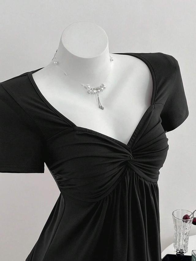casual elegant black twist knot v-neck short sleeve top