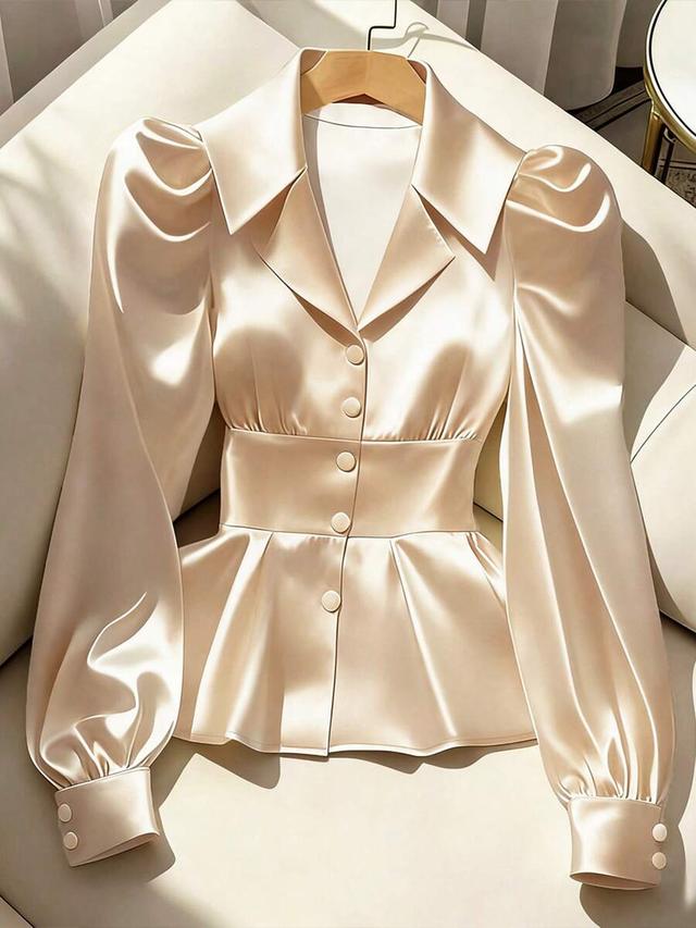 elegant champagne satin peplum blouse with puff sleeves
