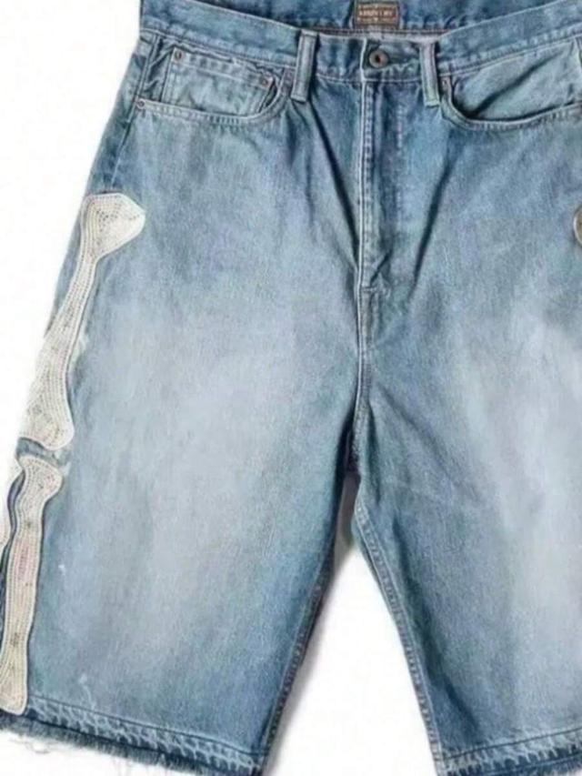 casual denim shorts with decorative side embroidery