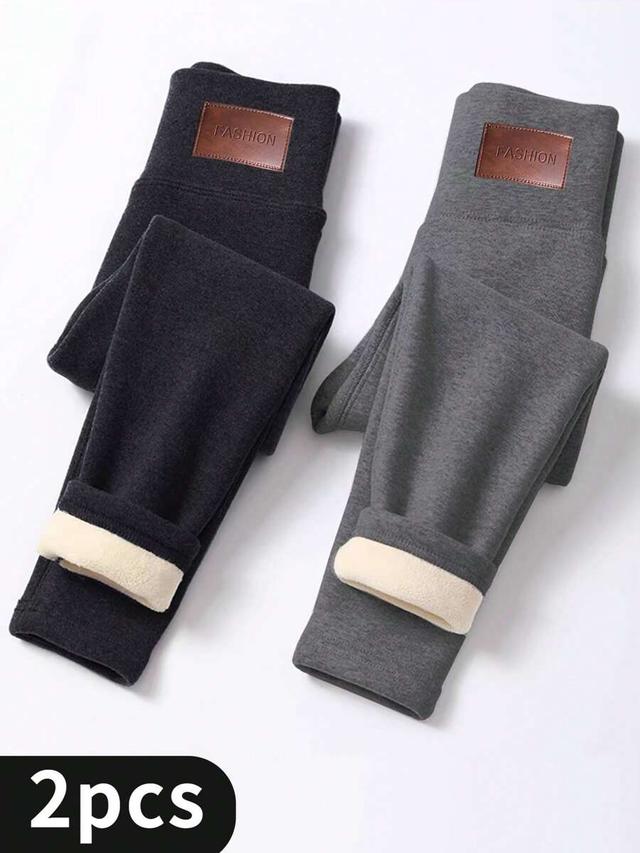 cream two pairs of thermal lined high waisted leggings