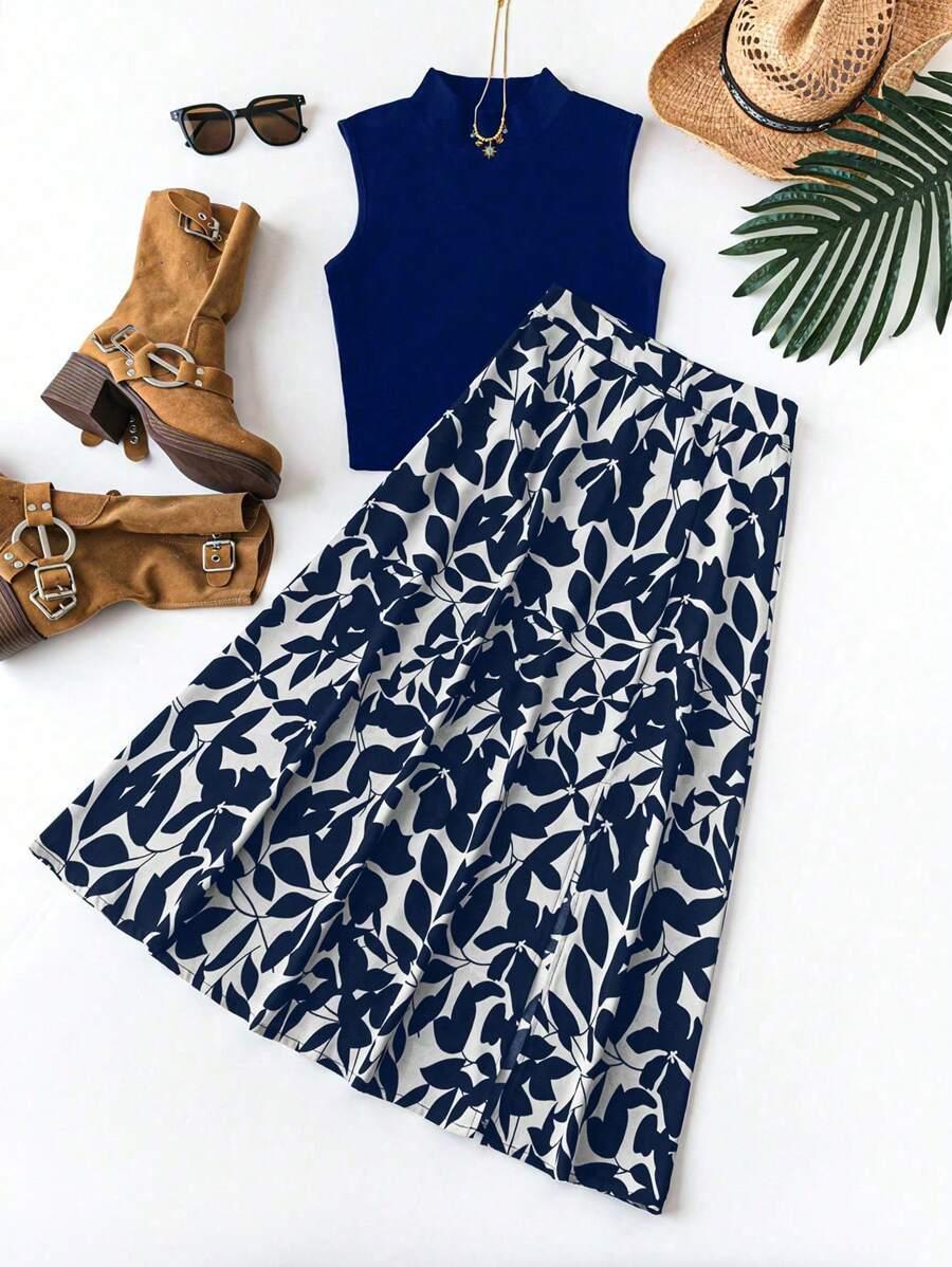 navy blue sleeveless stand collar top and leaf print midi skirt