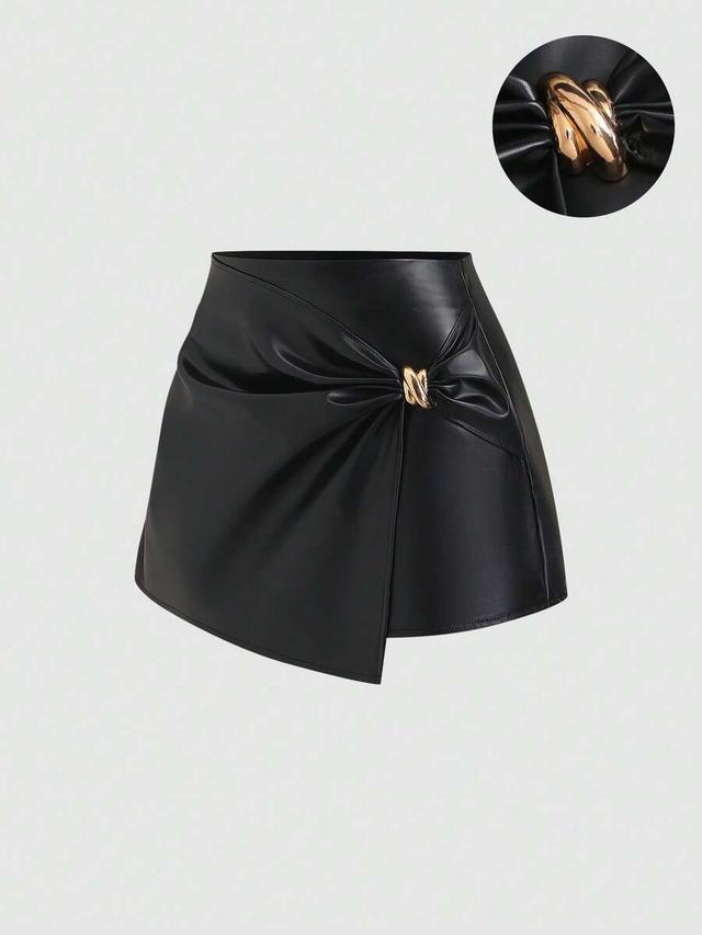 black faux leather pleated mini skirt with metal buckle