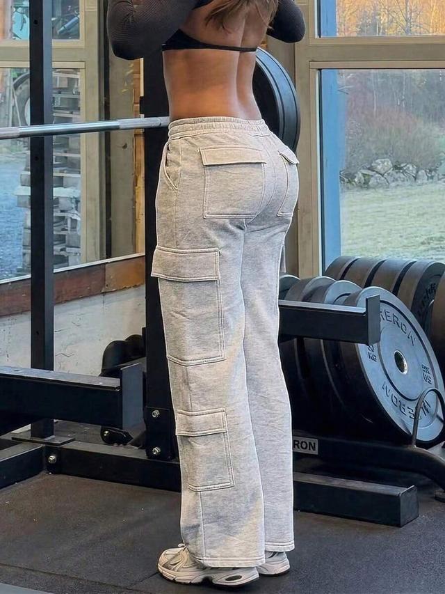 grey knit multi-pocket cargo sweatpants with elastic waist