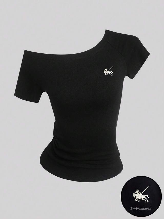 black asymmetrical shoulder t-shirt with embroidered horse logo