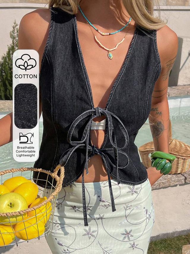fitted sleeveless black denim tie-up vest