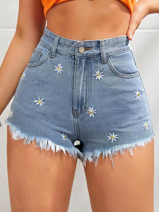 high waisted light wash denim shorts with daisy embroidery