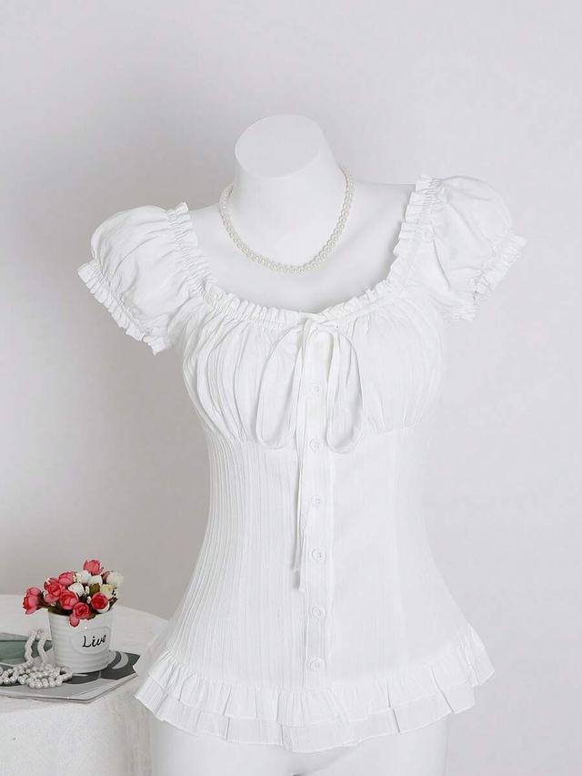 white waist-cinched ruffle tie-cuff short sleeve shirt
