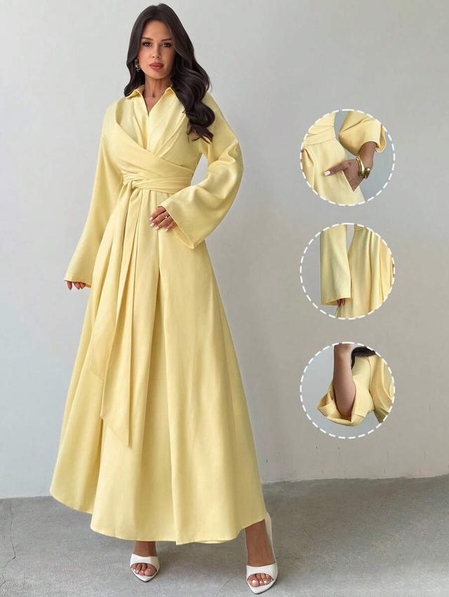 elegant pale yellow long sleeve tie waist dress