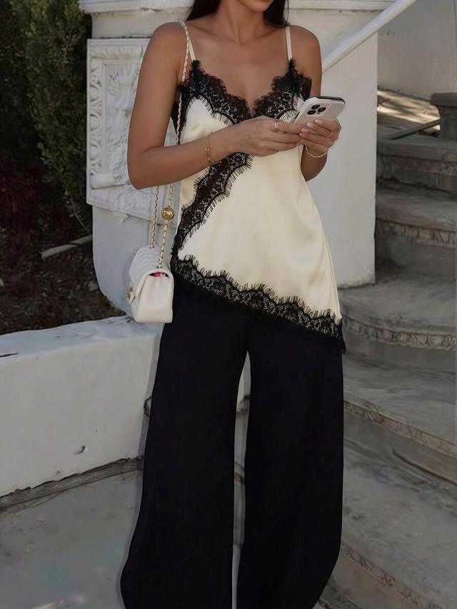 cream silk cami top with black lace trim