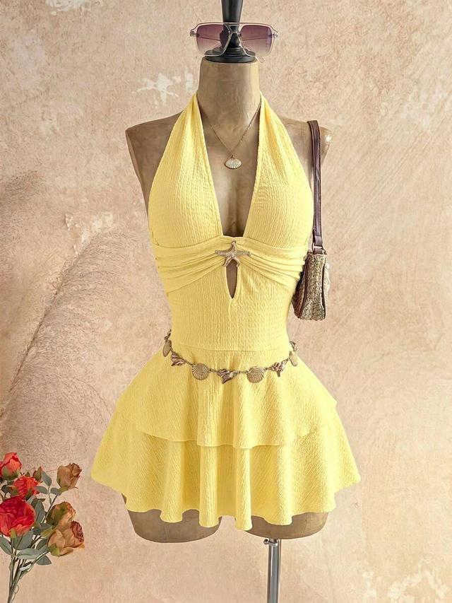 yellow halter mini dress with metal starfish detail