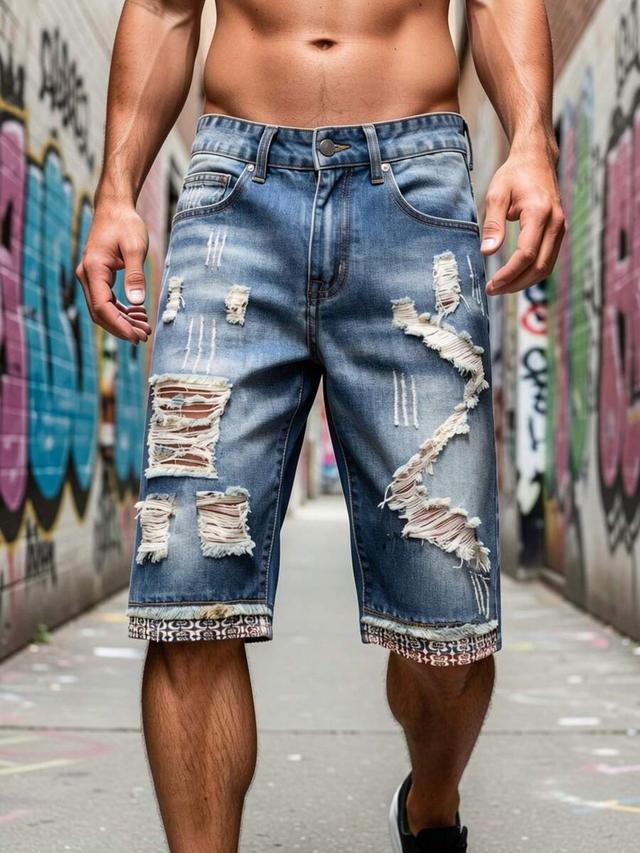 retro blue washed ripped denim shorts with patterned cuffs