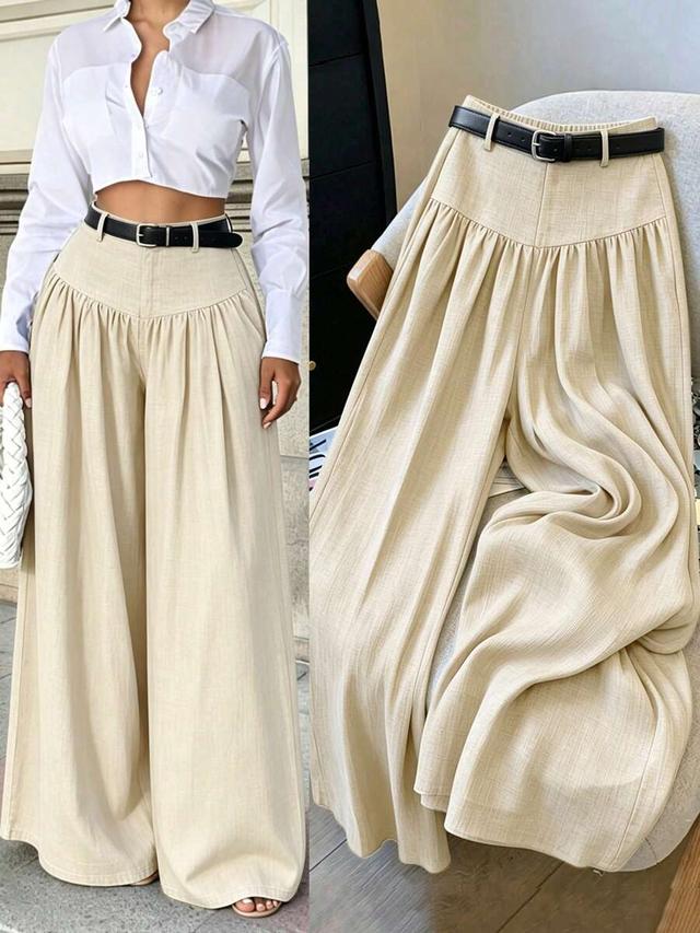 draped high-waisted wide leg trousers in beige