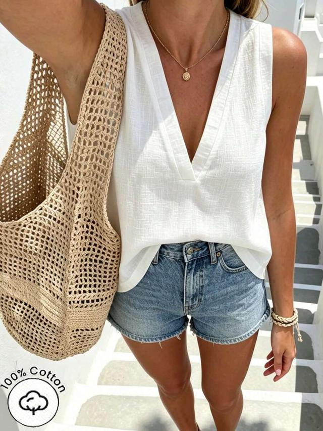 solid white v-neck sleeveless casual blouse
