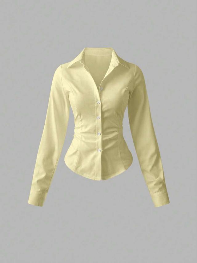 solid yellow waist cinched long sleeve button down shirt
