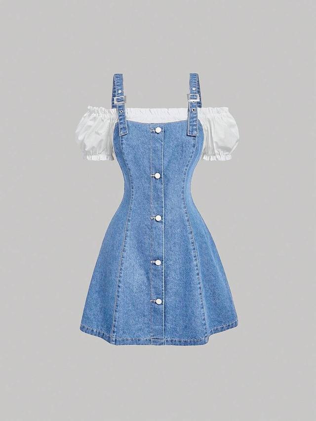 white pinafore dress with white puff sleeve blouse