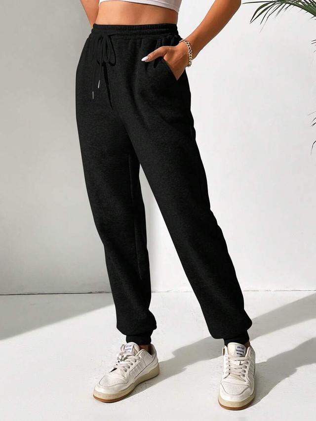 black drawstring waist slant pocket sweatpants