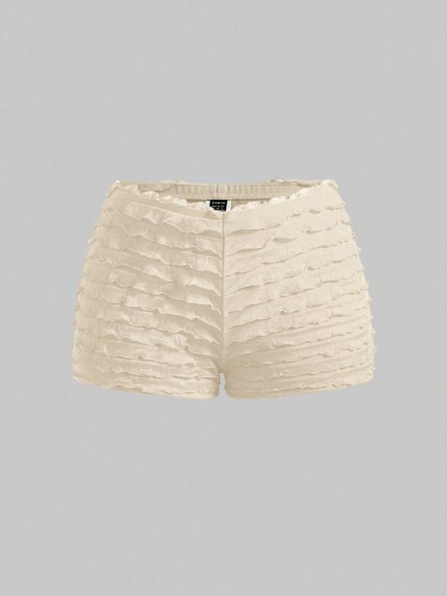 cream ruffled elastic waist mini shorts