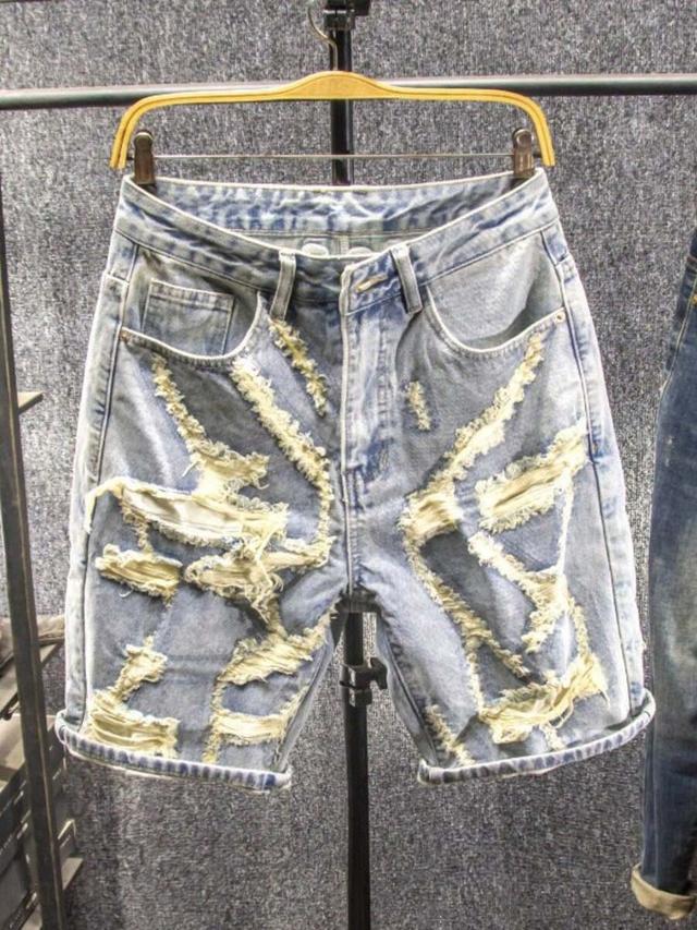 vintage washed distressed denim shorts with frayed detailing