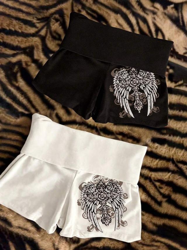 black y2k vintage textured wing and cross print shorts