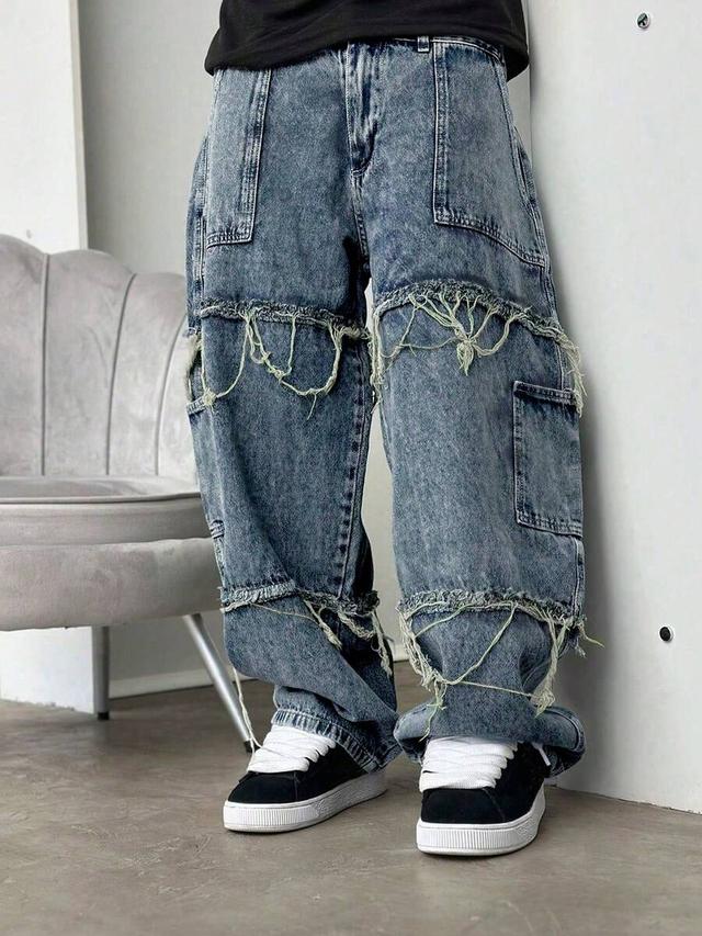 blue denim acid wash fringe detail loose straight leg jeans