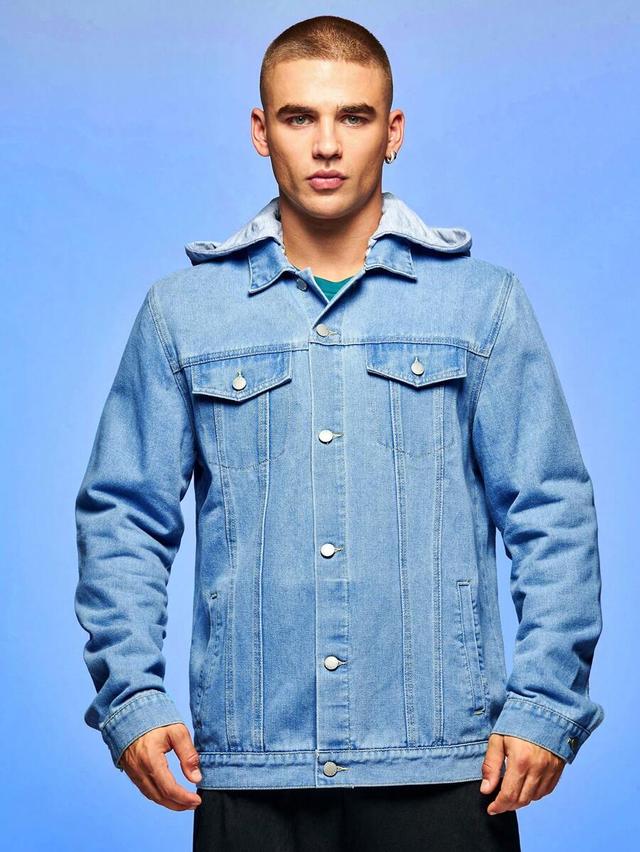 light wash denim jacket with grey jersey hood