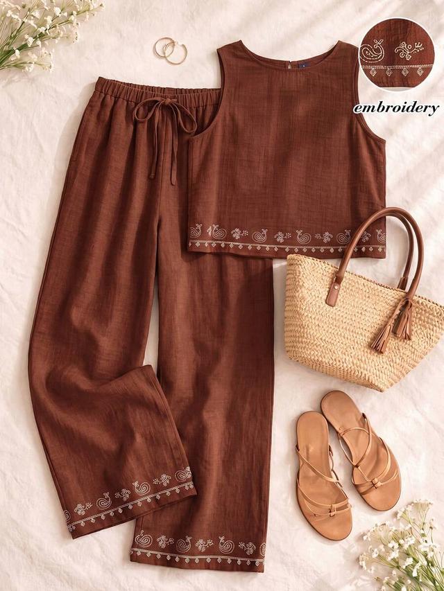 brown linen blend trousers with floral embroidery