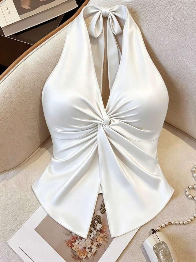 white satin halter twist asymmetrical hem camisole